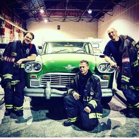 David Eigenberg with the cast members of the TV series Chicago Fire